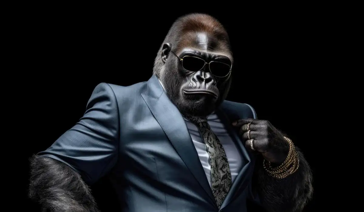 A happy gorilla in a suit and sunglasses on a black background