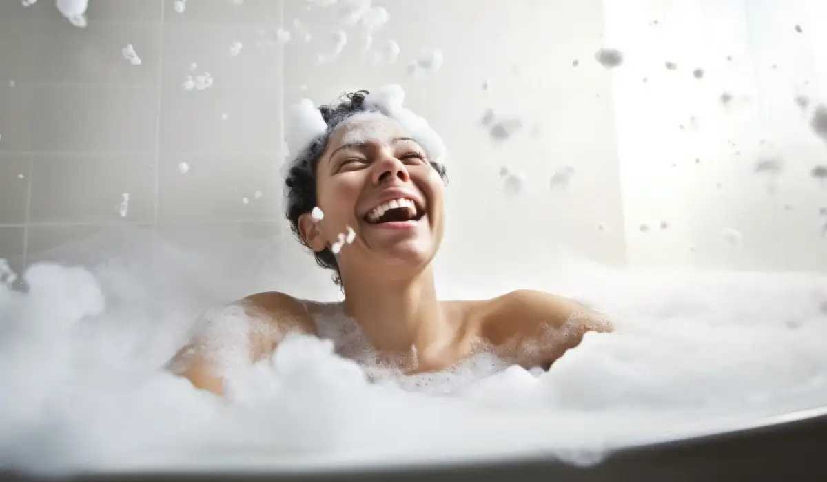 Woman bathing in a bubble bath