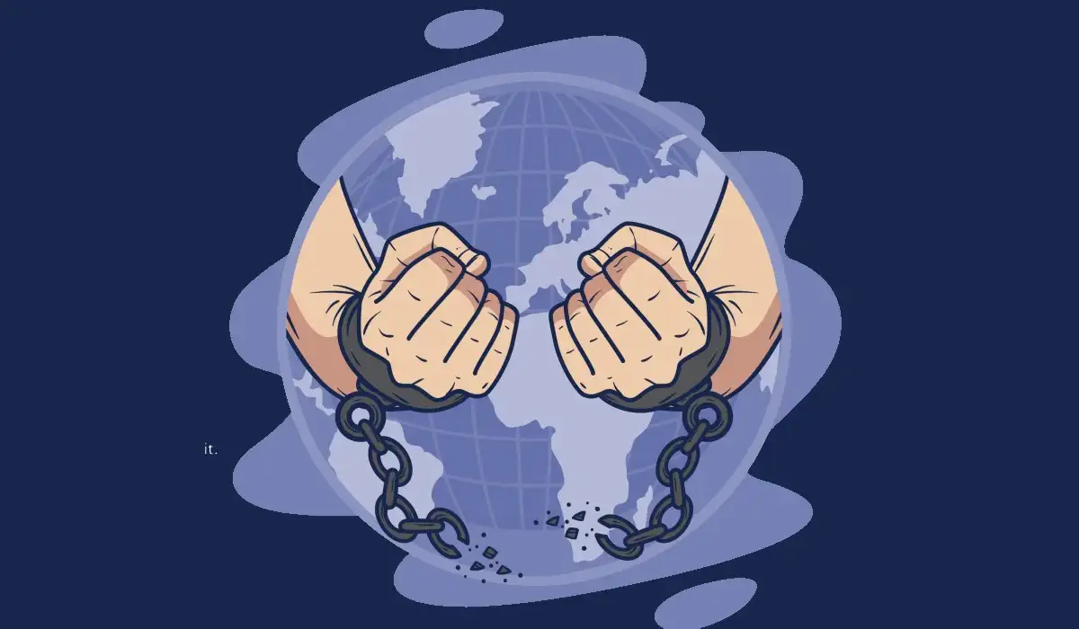 Hands breaking handcuffs against human trafficking