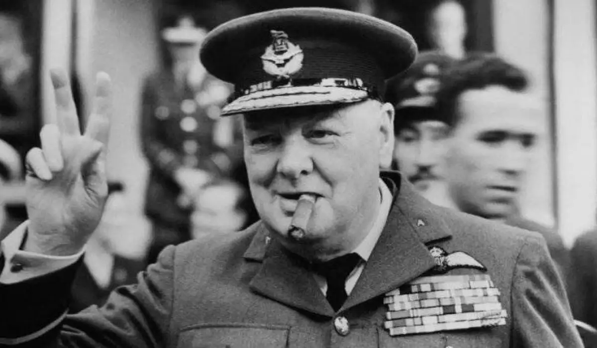 Winston Churchill dressed as a soldier with a cigar in his mouth