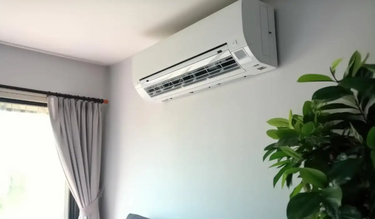 Air conditioner on wall background at home