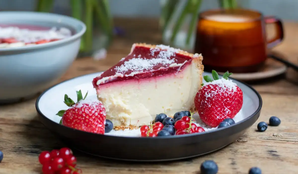 Cheesecake with gelatin decorated with strawberries and berries
