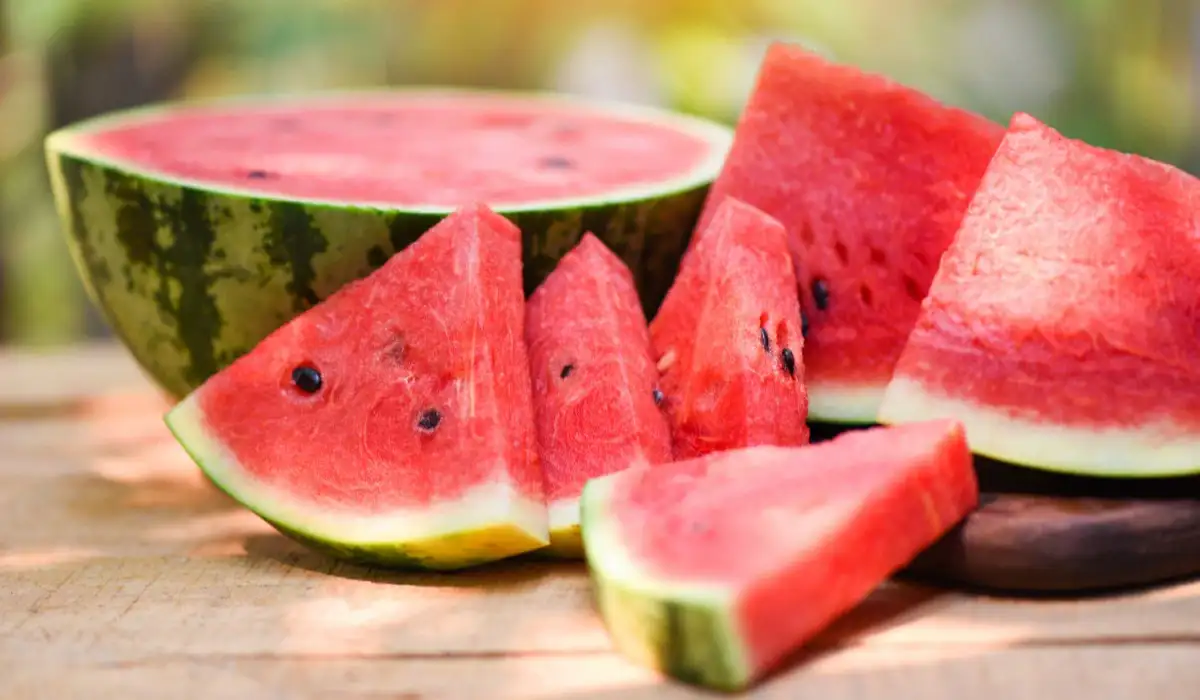 Sliced watermelon on wooden table