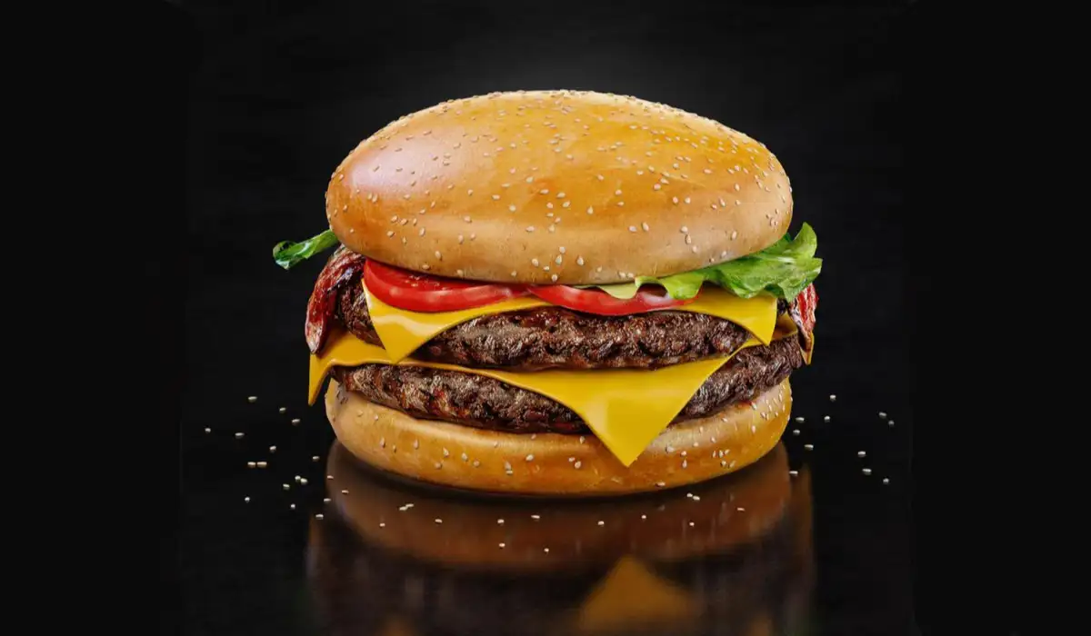 Photo double cheeseburger on black background