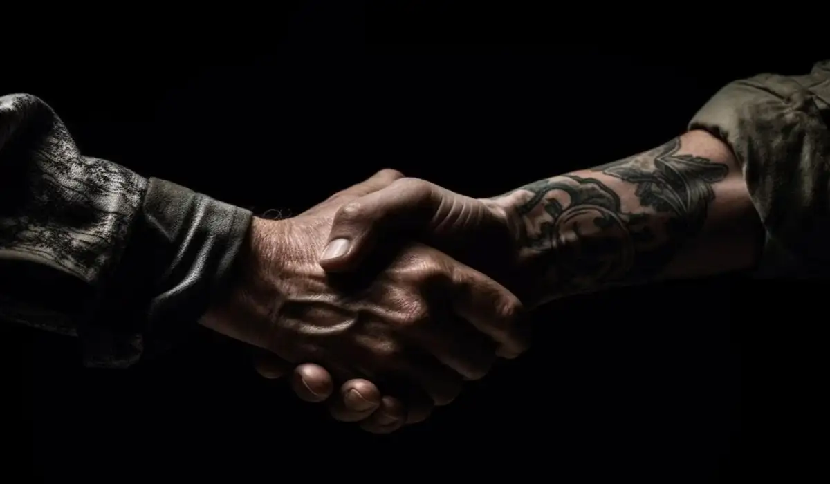 The handshake between two businessmen means a successful agreement