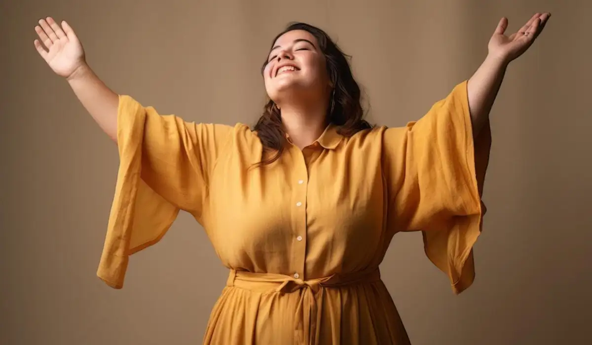 Studio shot of young plus size woman emotional gestures