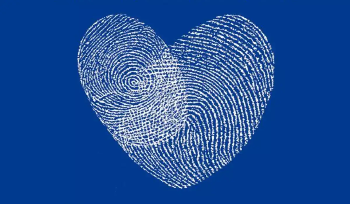 A heart with fingerprints on a blue background
