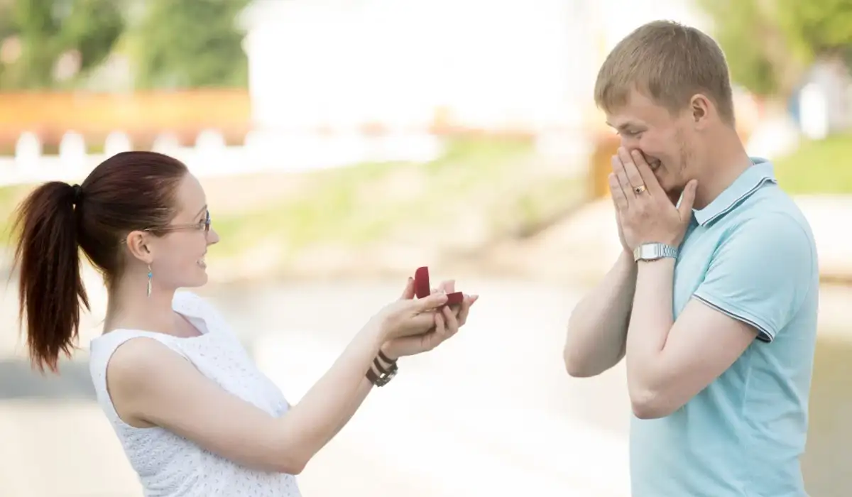 Man excited because his wife gives him an engagement ring