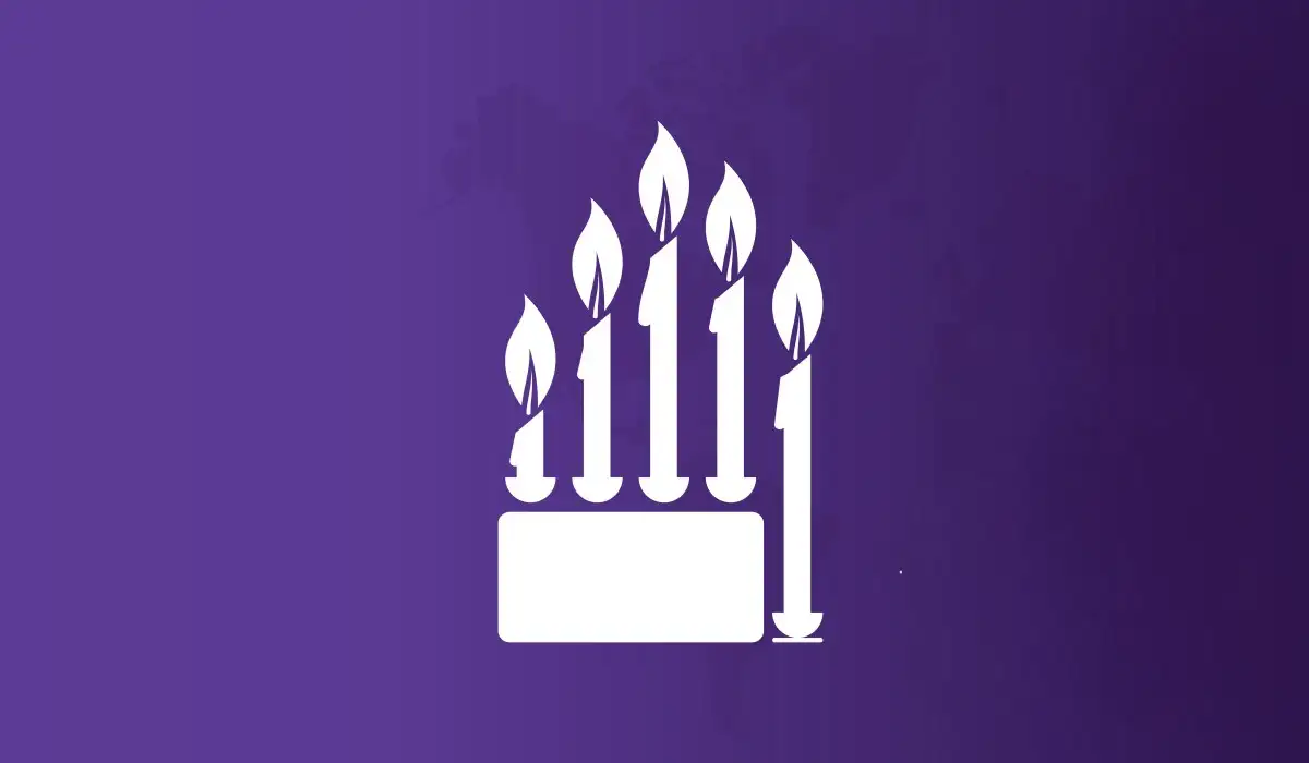Candles forming a hand wanting to stop, with a purple background